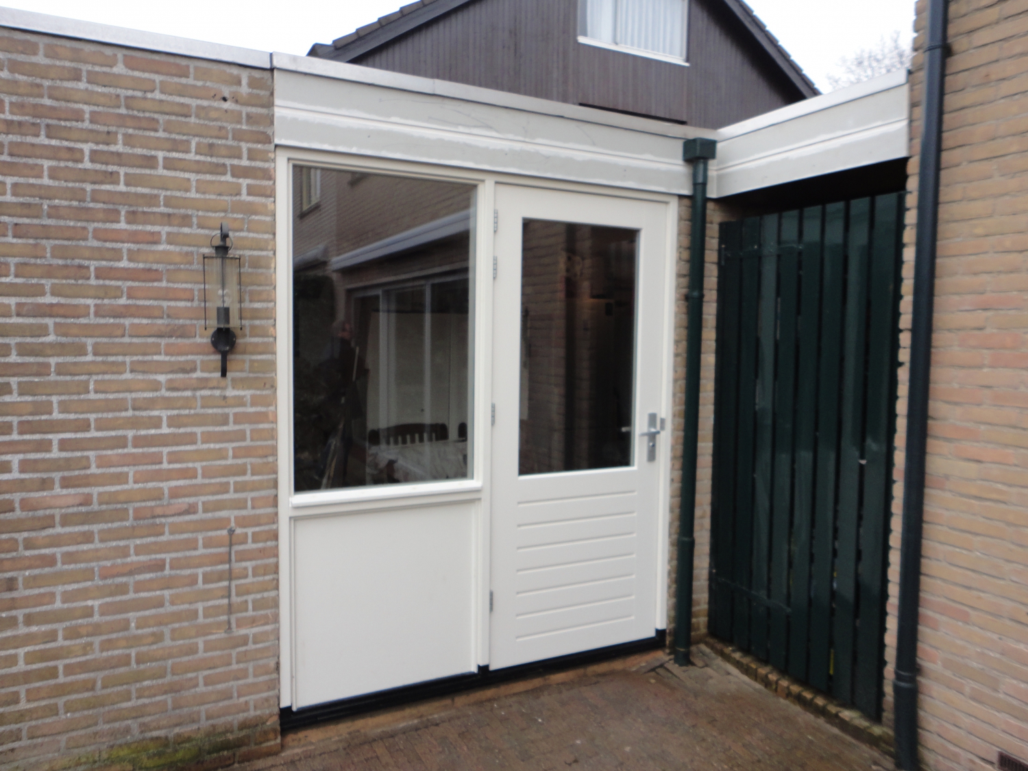 Garagedeur vervangen voor kozijn met deur Buitenplaats Lelystad